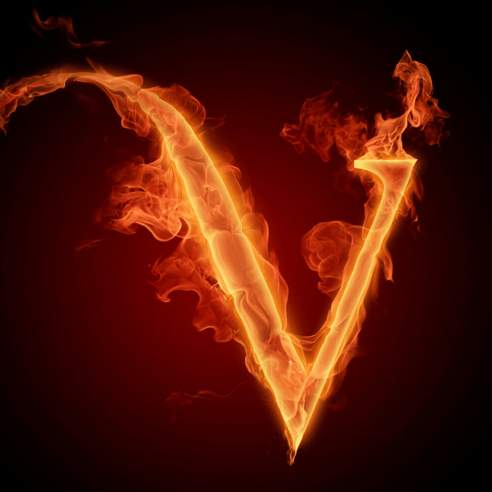 Крутой символ "V" в огне на темном фоне